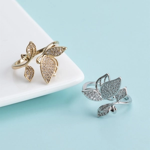 Adjustable gold and silver butterfly floral rings set with micro-pave cubic zirconia