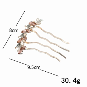 Detailed size and weight specs of gold 4-tooth hair comb with amber stones and rhinestones