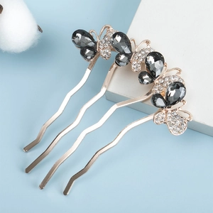 Elegant gold hair comb with three rhinestone butterflies and wave four-tooth design