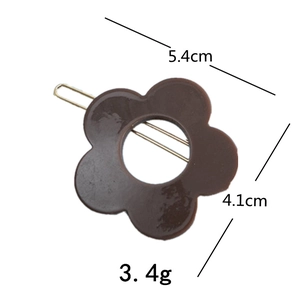 Barrette à cheveux fleur marron avec dimensions 5,4 cm x 4,1 cm et poids de 3,4 g