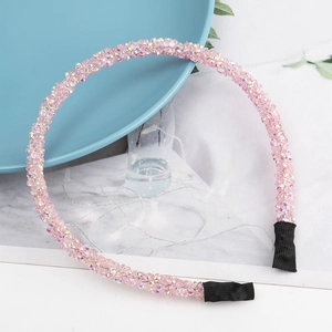 Elegante cerchietto per capelli in cristallo rosa con strass scintillanti su base in metallo