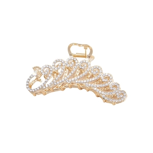 Elegant gold peacock wave hair claw clip with white rhinestones on white background