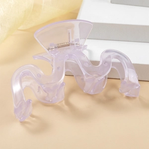 Elegant wave-shaped lavender hair claw clip made of translucent resin with metal spring