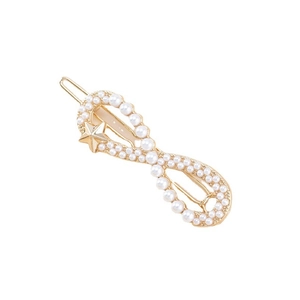 Barrette dorée en forme d'infini avec perles blanches et petite étoile dorée décorative