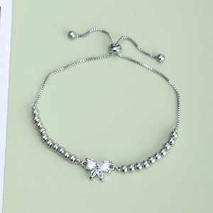 Minimalist silver bow bracelet with sparkling cubic zirconia and adjustable bead chain