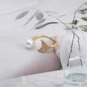 Elegant gold mermaid tail open ring with white pearl and sparkling zircon accents