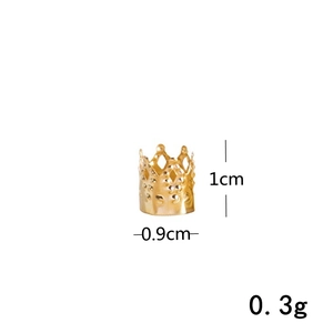 Detail view of golden crown dreadlock bead measuring 1cm by 0.9cm for hair decoration