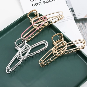 Minimalist metal safety pin hair claw clips in gold and silver finish for women