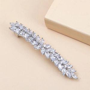 Detailed view of silver wheat-shaped hair clip featuring marquise-cut white zircons