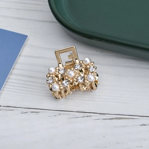 Mini pinza de pelo dorada con perlas blancas y diamantes de imitación para mujer