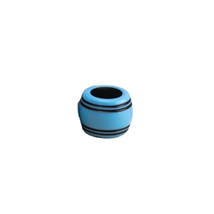 Macro shot of sky blue cylindrical dreadlock beads with black stripe details