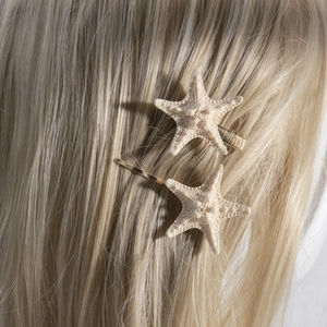 Starfish hair clip set with natural shell texture and golden metal for beach vacation