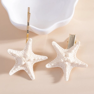 Starfish hair clip set with cream resin texture and gold metal base for beach vacation