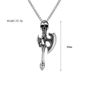 Detailed macro view showing the 60mm skull battle axe pendant with oxidized steel texture