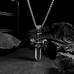 Gothic dagger pendant necklace with skull and cross details in vintage silver finish