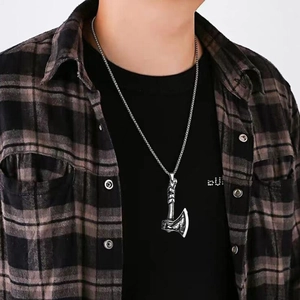 Men's vintage silver Viking axe pendant necklace featuring intricate embossed patterns