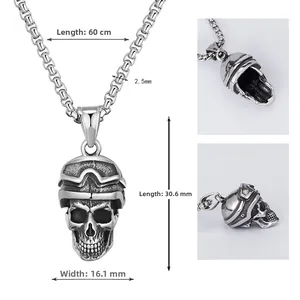 Detail view of vintage silver skull pendant with helmet and goggles on square box chain
