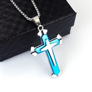 Detail of double-layer stainless steel cross pendant in silver and electric blue finish