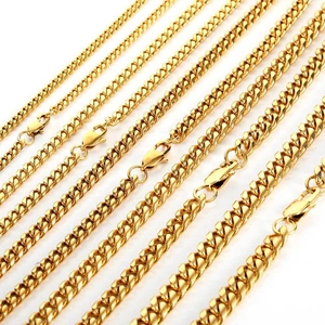 Detail showing various widths of gold-plated stainless steel curb link necklaces