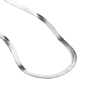 Macro shot of flat silver snake chain showing the detailed polished stainless steel texture
