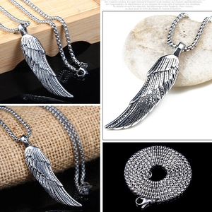 Vintage oxidized stainless steel angel wing pendant necklace with detailed engravings