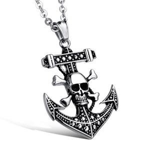 Close-up of gothic pirate anchor pendant with skull and crossbones on steel chain