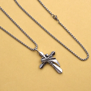 Gothic titanium steel cross necklace with twisted texture for men on yellow background