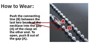 Detailed macro view showing the stainless steel ball chain and groove connector mechanism