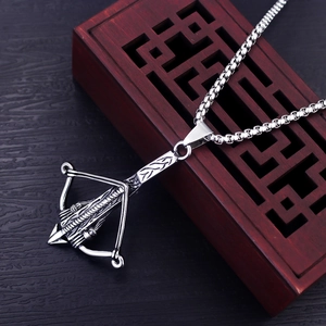 Retro stainless steel crossbow pendant necklace with punk hip hop style on wooden box