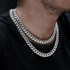 Polished silver Cuban link chain necklace set in stainless steel for a modern look