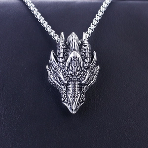 Vintage silver dragon head pendant necklace in stainless steel with a gothic dragon design