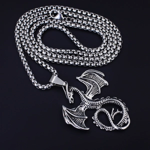 Detailed silver dragon pendant with wings and scales on a stainless steel chain