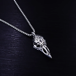 Nordic Viking crow skull pendant necklace in silver stainless steel with engraved patterns