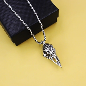 Viking raven skull pendant necklace in stainless steel with intricate gothic carvings