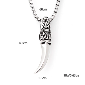 Vintage silver wolf tooth pendant necklace with woven box chain and embossed texture detail