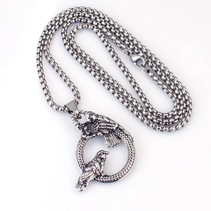 Detail of Viking raven ring pendant in antique silver stainless steel with box chain