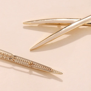 Golden alloy hair clip set with smooth curve and hollow lattice geometric designs