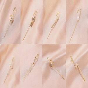 Set of 8 gold minimalist stud earrings with rhinestones, pearls and leaf shapes