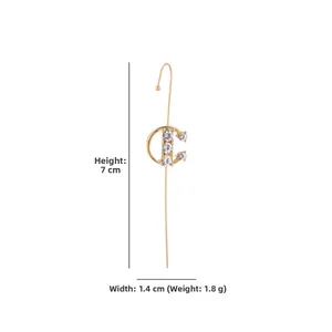 Detail view of a gold D-shaped ear climber with three inlaid zircons and measurements