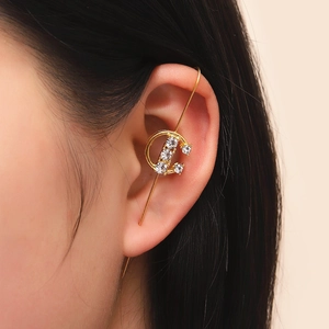 Detailed close-up of a gold lightning leaf ear crawler with sparkling rhinestones