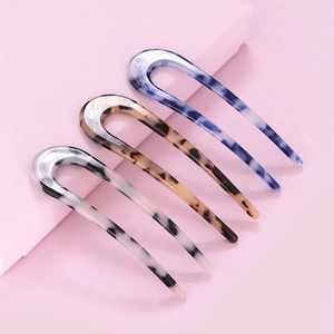 Three-piece set of U-shaped acetate hair pins in tortoiseshell and marble patterns