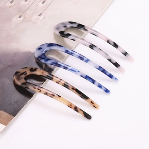 U-shaped hair pin set in leopard tortoiseshell, marble pink, and blue ink textures