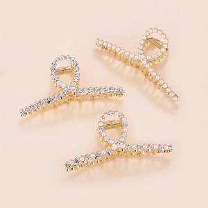Three-piece gold metal hair claw clips set featuring sparkling rhinestones and white pearls