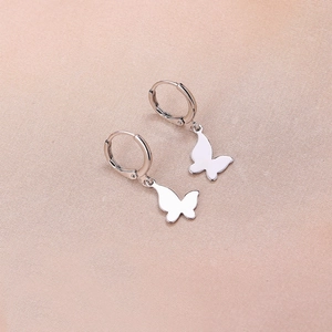 Minimalist silver butterfly drop earrings with polished metal finish and hoop clasp