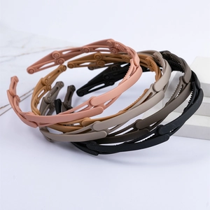 Five matte folding headbands with retractable teeth design in various earth-tone colors