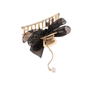 Elegant gold metal hair claw with black mesh bow and white pearl tassel in Korean style
