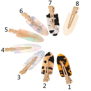 Pack de 8 barrettes en acétate motifs léopard, floral et marbre avec pinces dorées