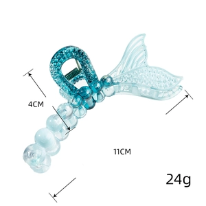 Blue fishtail hair claw clip in transparent resin with shimmer showing 11cm length size