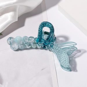 Blue gradient resin claw clip with elegant mermaid tail design and fish scale texture