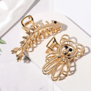 Zweiteiliges Set goldene Haarklammern in Bärenform und Fischgräten-Design mit Strass